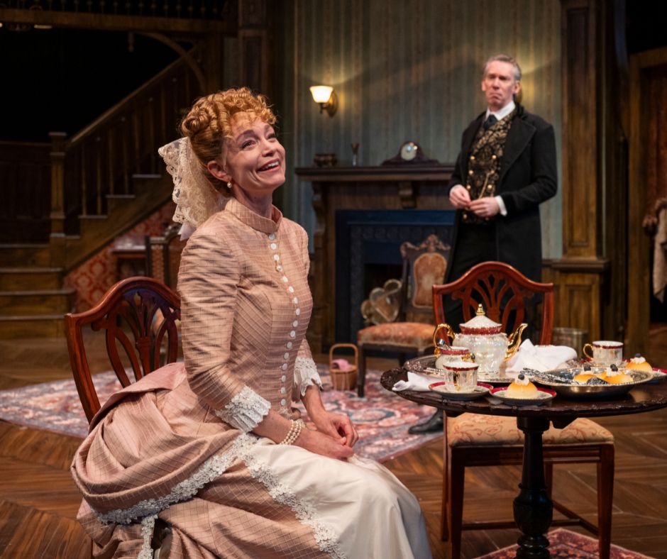 Belle sits downstage smiling outwardly. Jack is upstage of her, slightly out of focus, watching her intently.