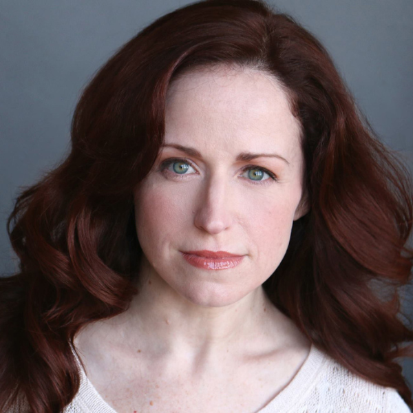 Actress Heidi Kettenring in front of a gray backdrop