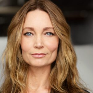 Actress Cheyenne Casebier in a blue top, staring into the camera