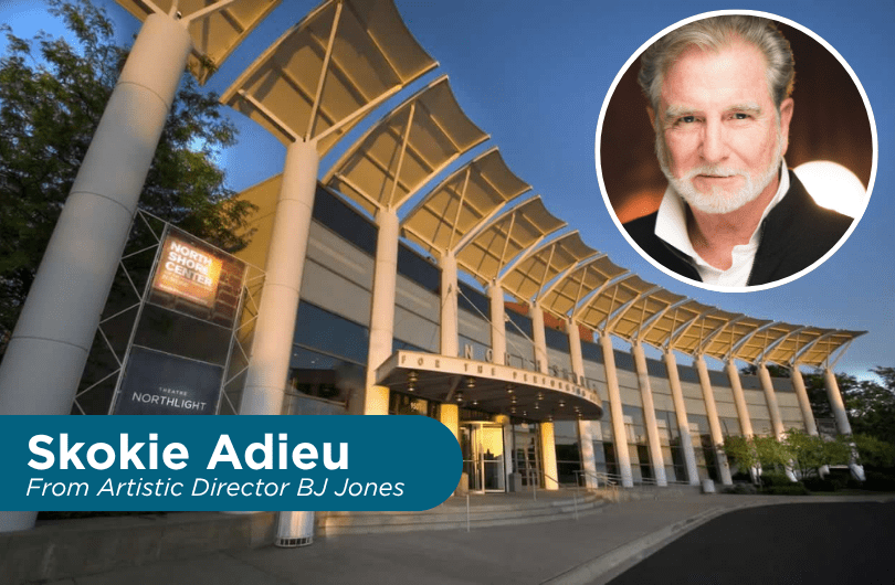 An exterior shot of the North Shore Center for the Performing Arts in Skokie at night. BJ Jones headshot is in a circular frame in the upper right hand corner. White text over a blue background in the bottom left corner reads "Skokie Adieu from Artistic Director BJ Jones"